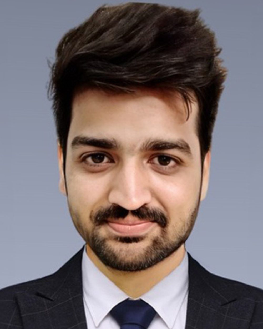 Ahsan M., retention email specialist for Shopify brands, at his desk